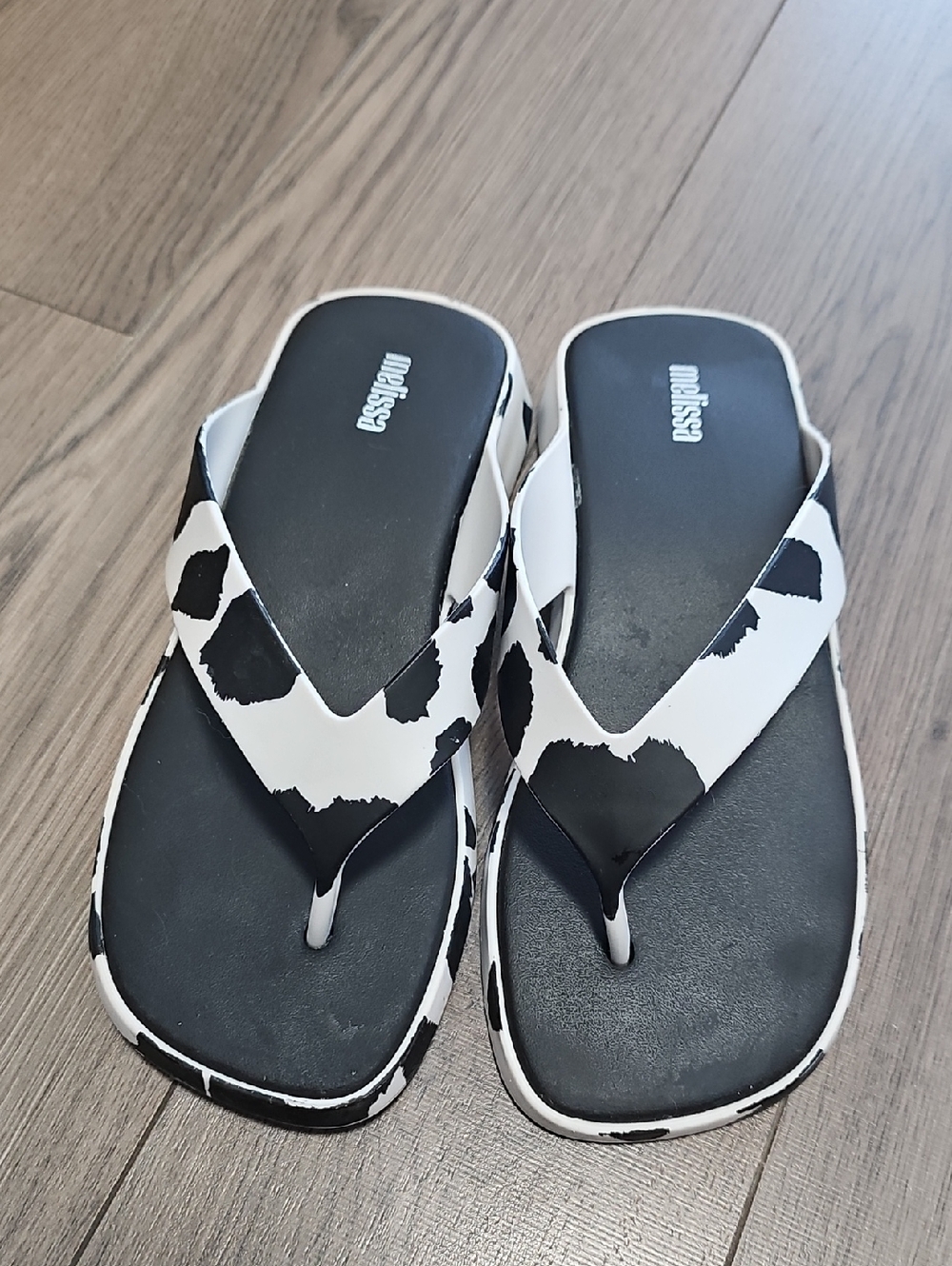 Melissa Black & White Cow-Print Flip Flops